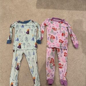 Little sleepies pajamas 2T.  Anna and Elsa and Part of her world!